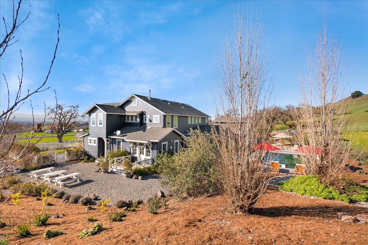 7670 Crews Road Gilroy, CA 95020 - Photo 71 of 83 a house view with a wooden fence