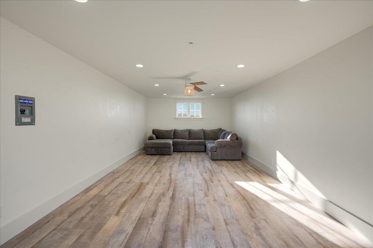 7670 Crews Road Gilroy, CA 95020 - Photo 80 of 83 a living room with furniture and a large window