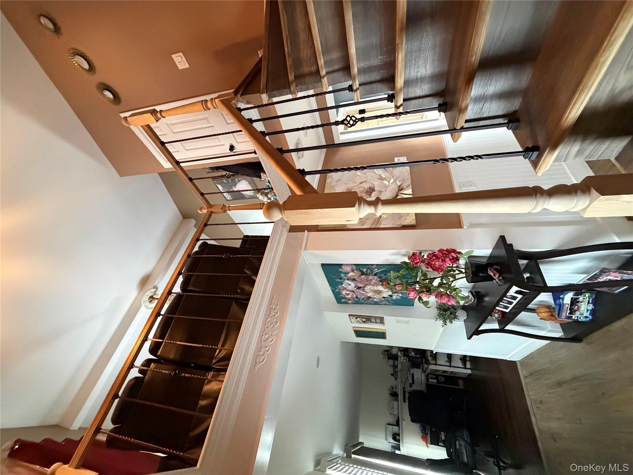 17 Hampton Road Shirley, NY 11967 - Photo 4 of 26 a living room with furniture and wooden floor