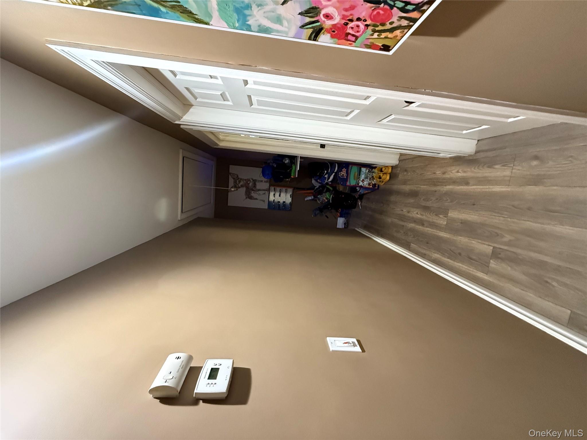 17 Hampton Road Shirley, NY 11967 - Photo 8 of 26 a view of a hallway with stairs