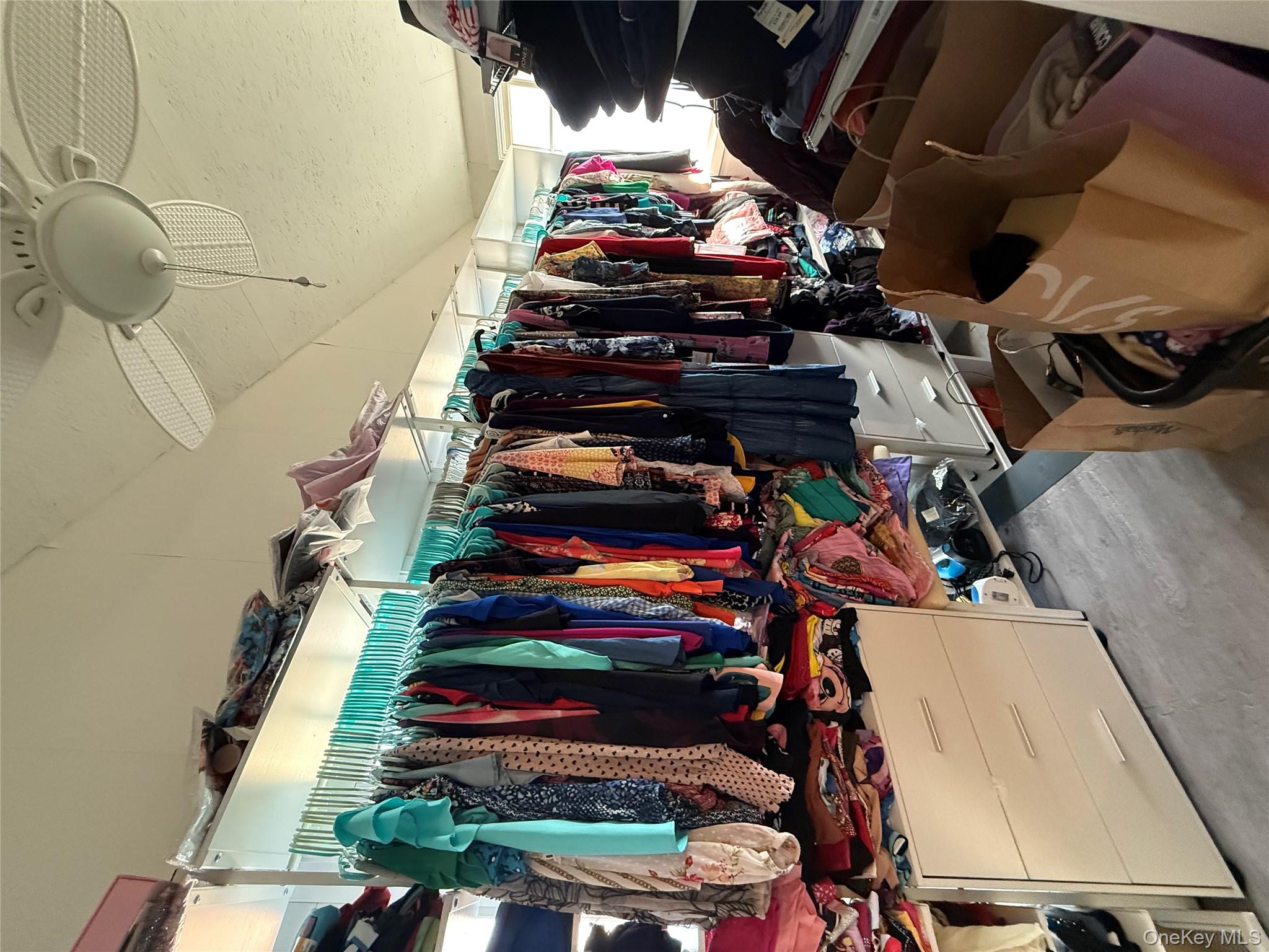 17 Hampton Road Shirley, NY 11967 - Photo 10 of 26 a view of walk in closet with clothes