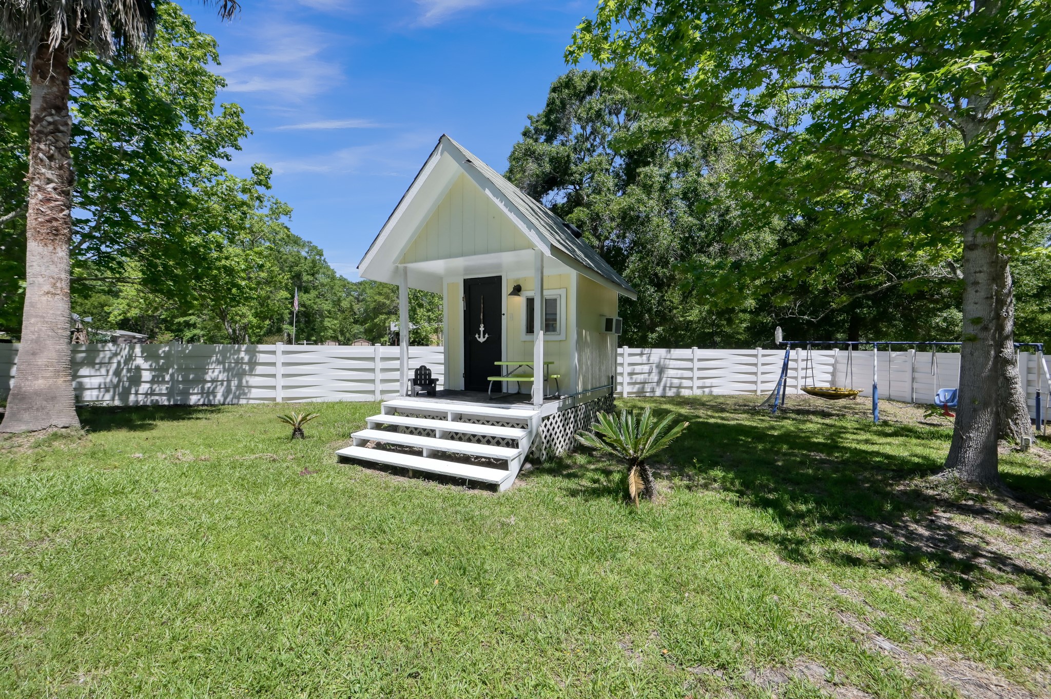 13685 Tommy Smith Road Conroe, TX 77306 - Photo 39 of 50 Pool house - originally a playhouse, now being used as pool toy/float storage - great changing space.