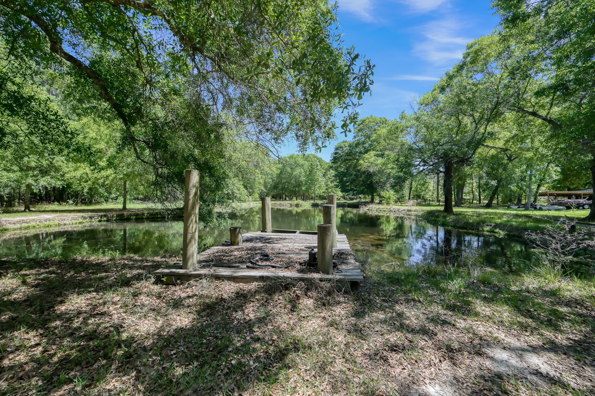 13685 Tommy Smith Road Conroe, TX 77306 - Photo 40 of 50 Pond w/small dock