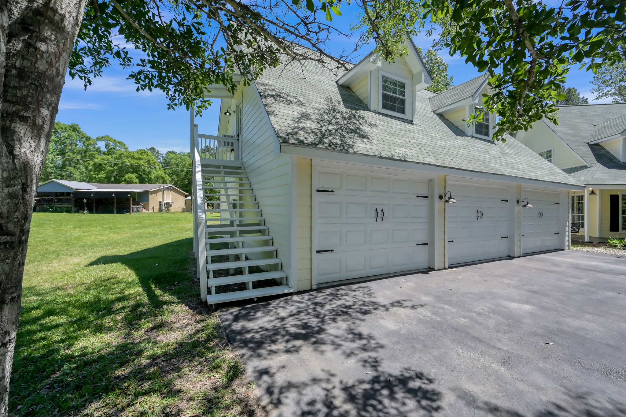 13685 Tommy Smith Road Conroe, TX 77306 - Photo 41 of 50 3 Car Garage with Bonus Room and Full Bathroom Upstairs.