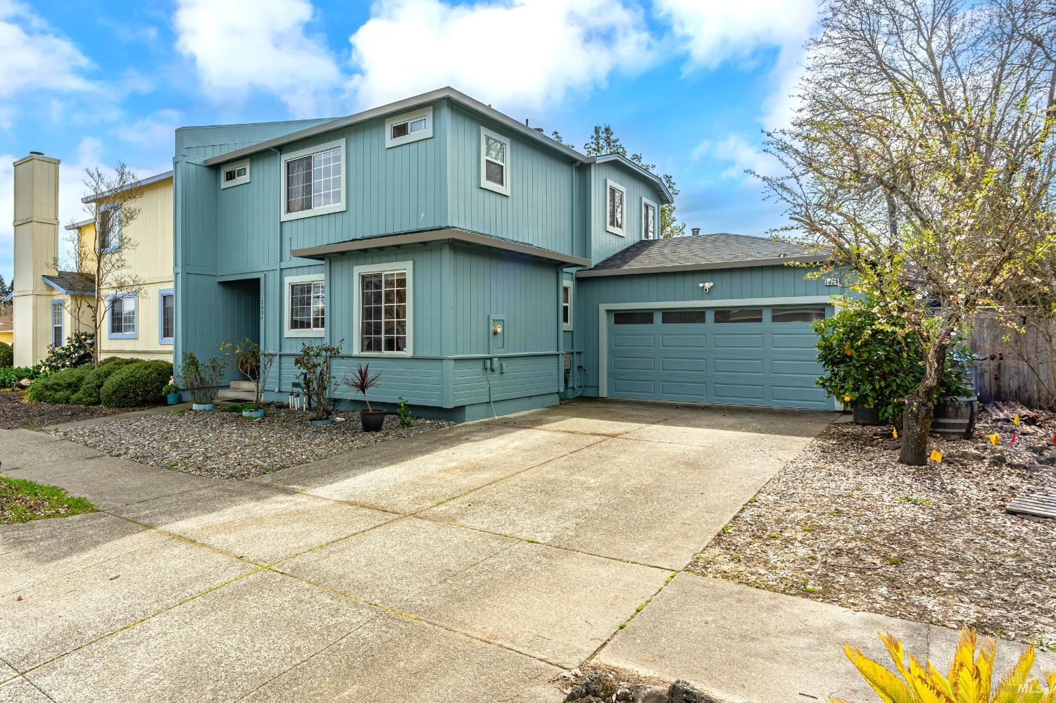 2004 Lapper Avenue Santa Rosa, CA 95403 - Photo 1 of 1 a front view of a house with garden