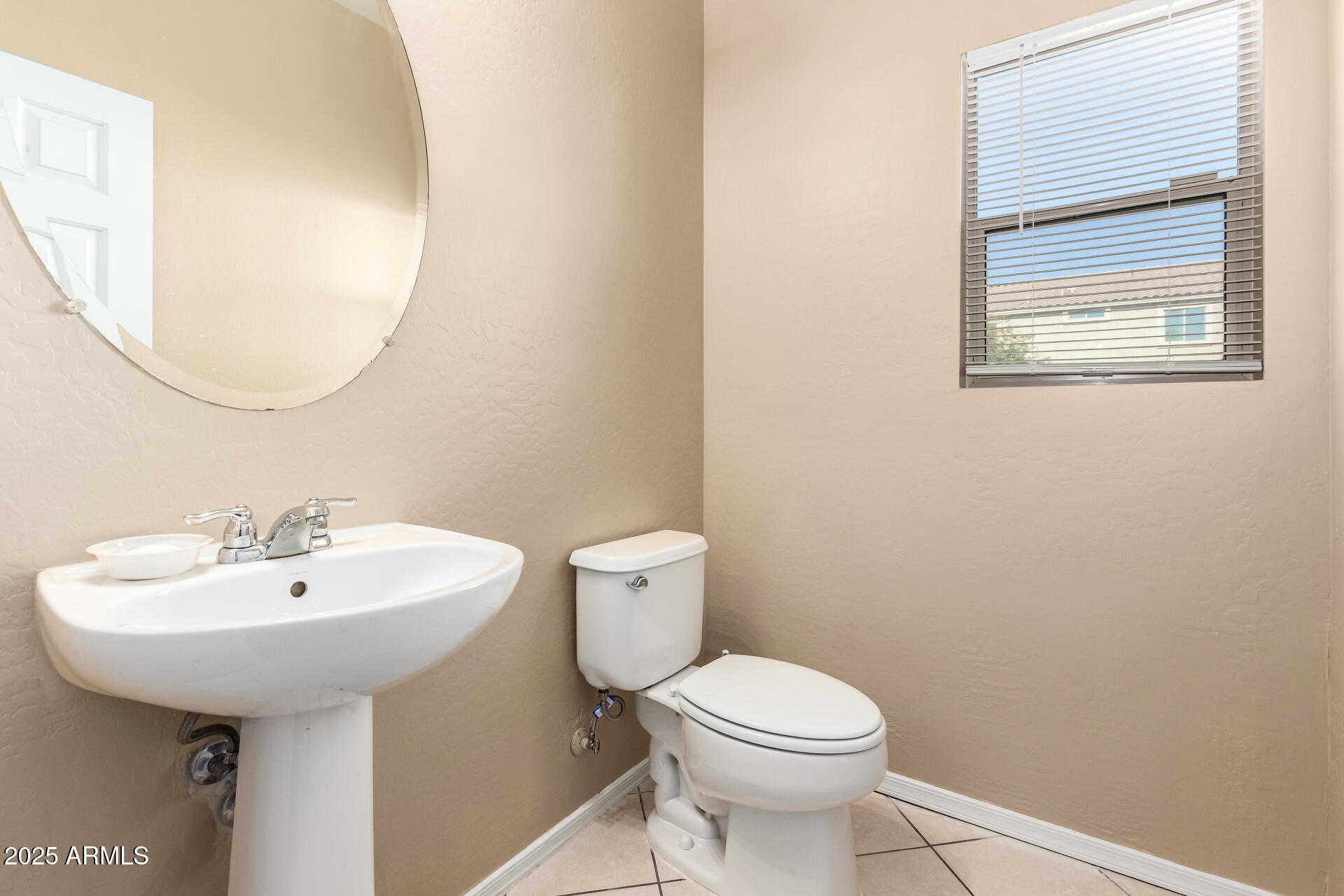 5132 West Shumway Farm Road Laveen, AZ 85339 - Photo 13 of 32 down stairshalf bathroom