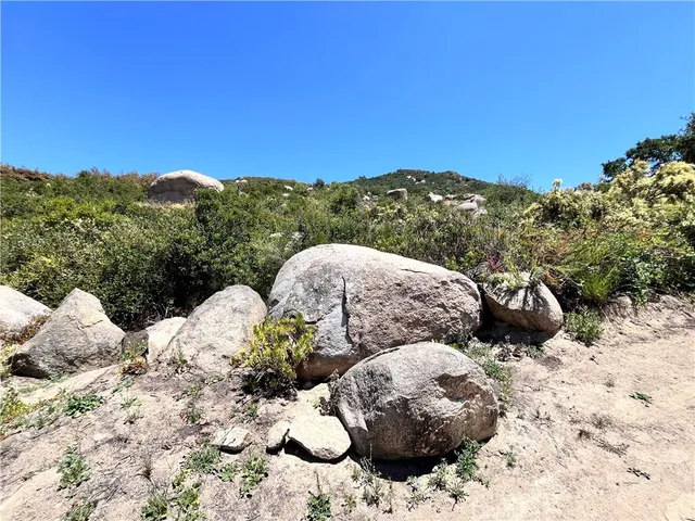 a view of outdoor space and mountains in the background