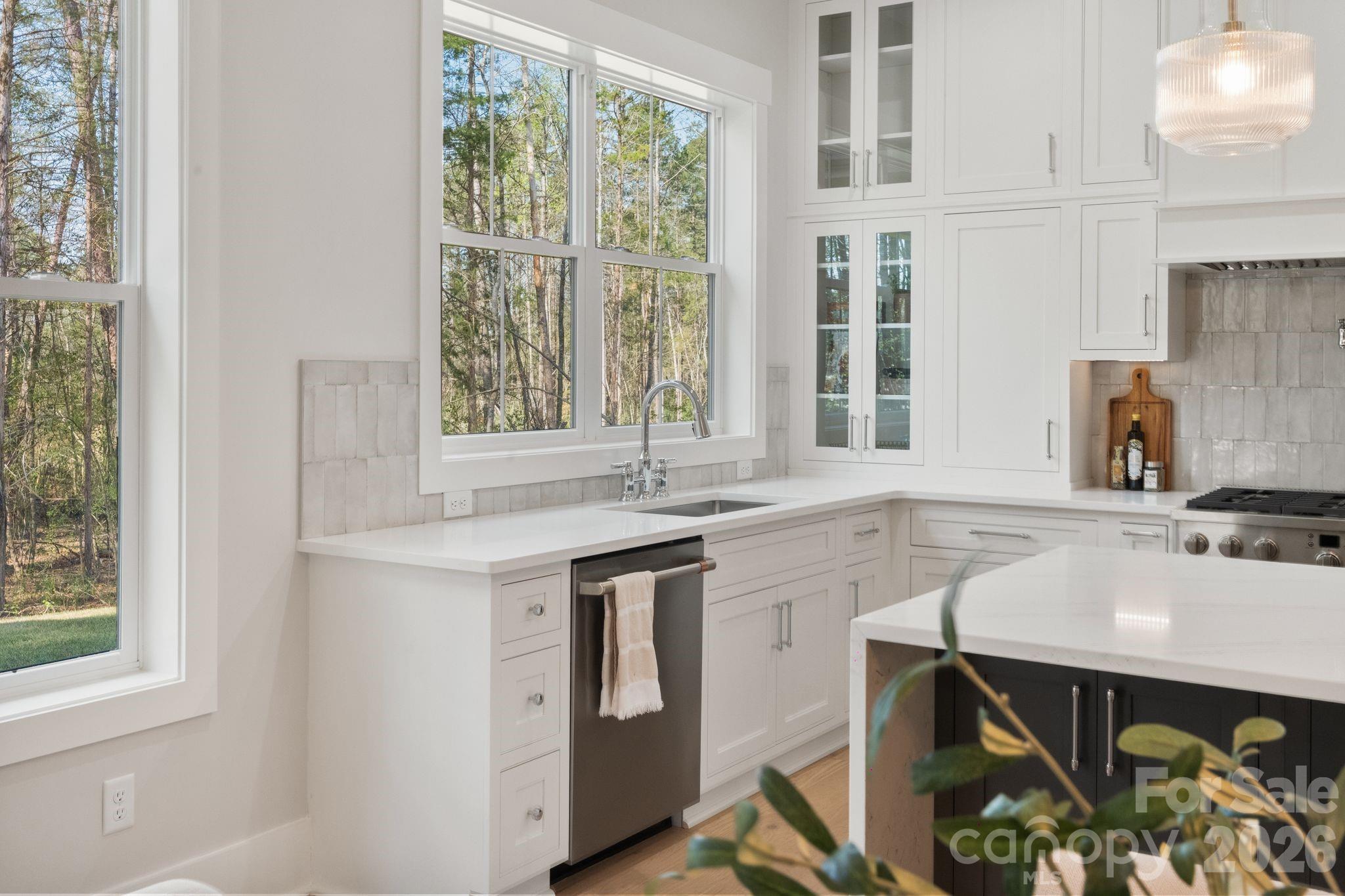 568 Longleaf Pine Lane Clover, SC 29710 - Photo 14 of 48 a kitchen with a sink stove and cabinets