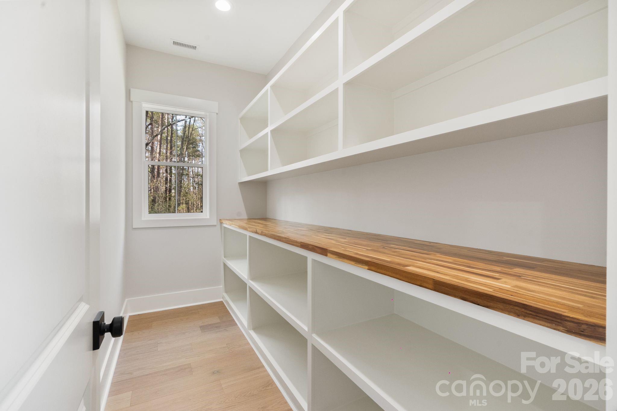 568 Longleaf Pine Lane Clover, SC 29710 - Photo 16 of 48 a view of an empty walk in closet