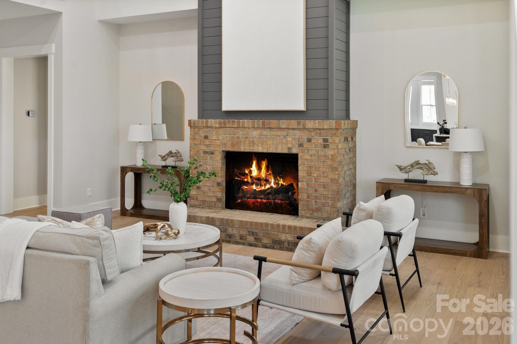 568 Longleaf Pine Lane Clover, SC 29710 - Photo 20 of 48 a living room with furniture and a fireplace