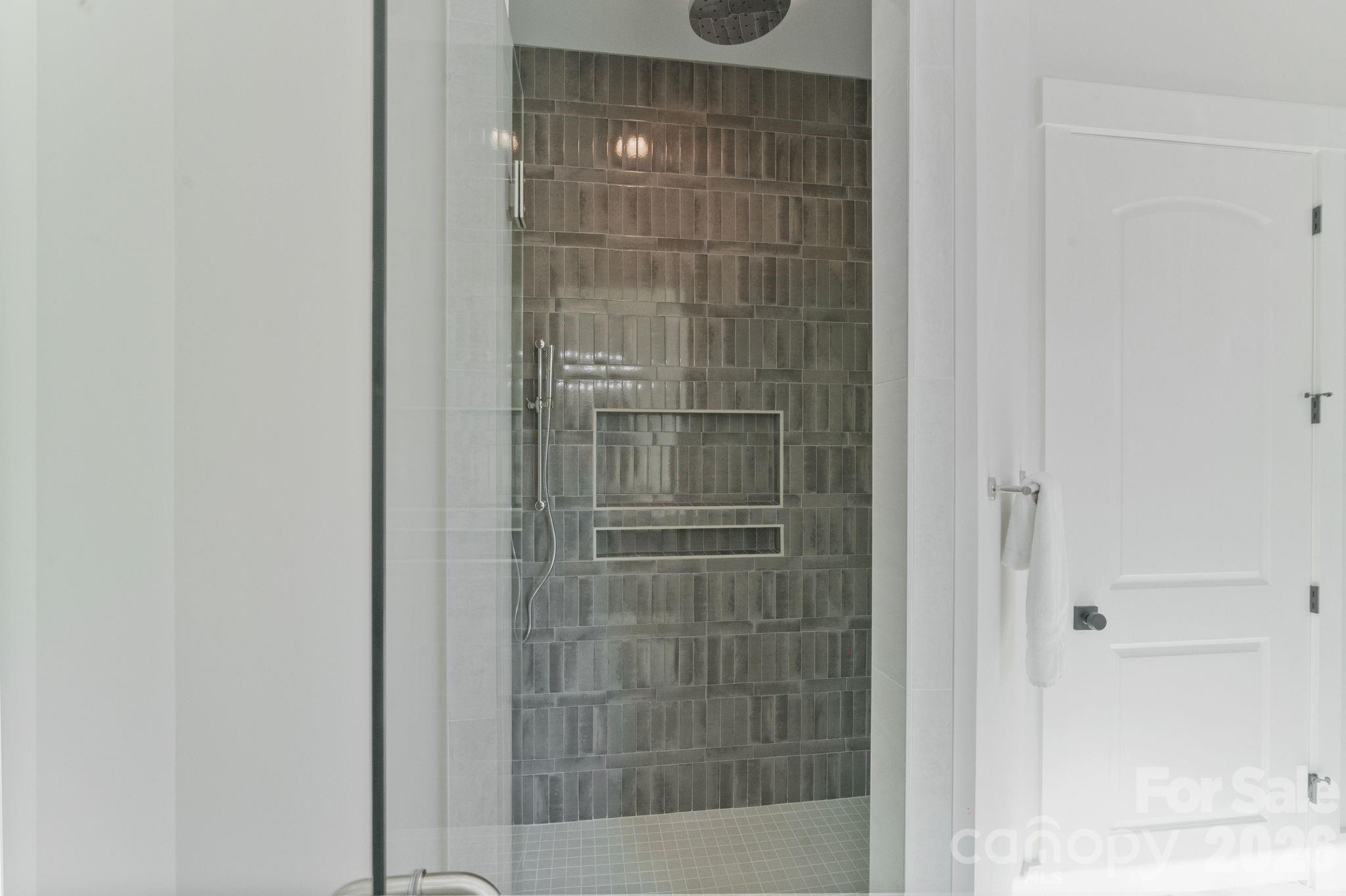 568 Longleaf Pine Lane Clover, SC 29710 - Photo 30 of 48 a bathroom with a shower