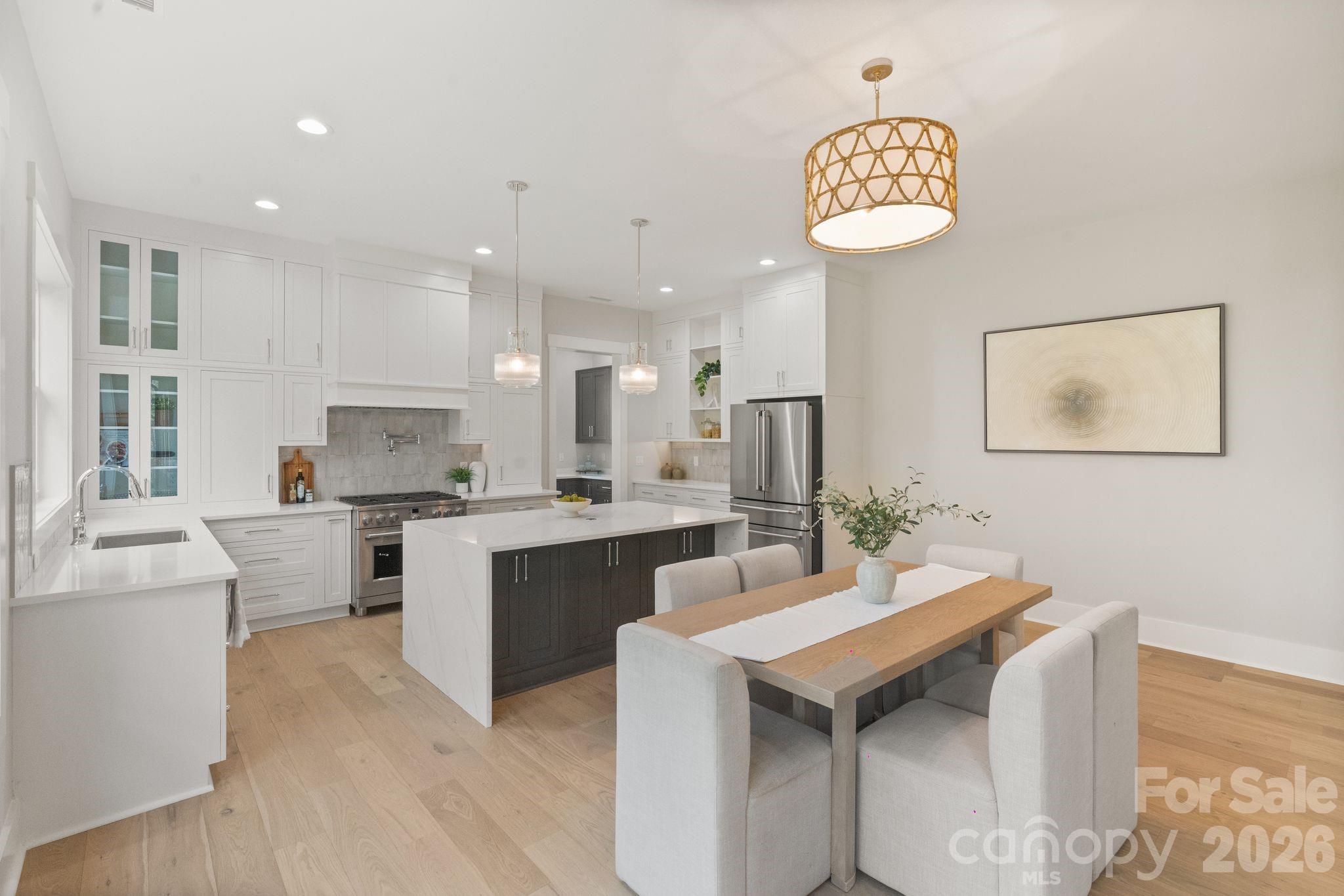 568 Longleaf Pine Lane Clover, SC 29710 - Photo 3 of 48 a living room with stainless steel appliances kitchen island granite countertop furniture and a kitchen view