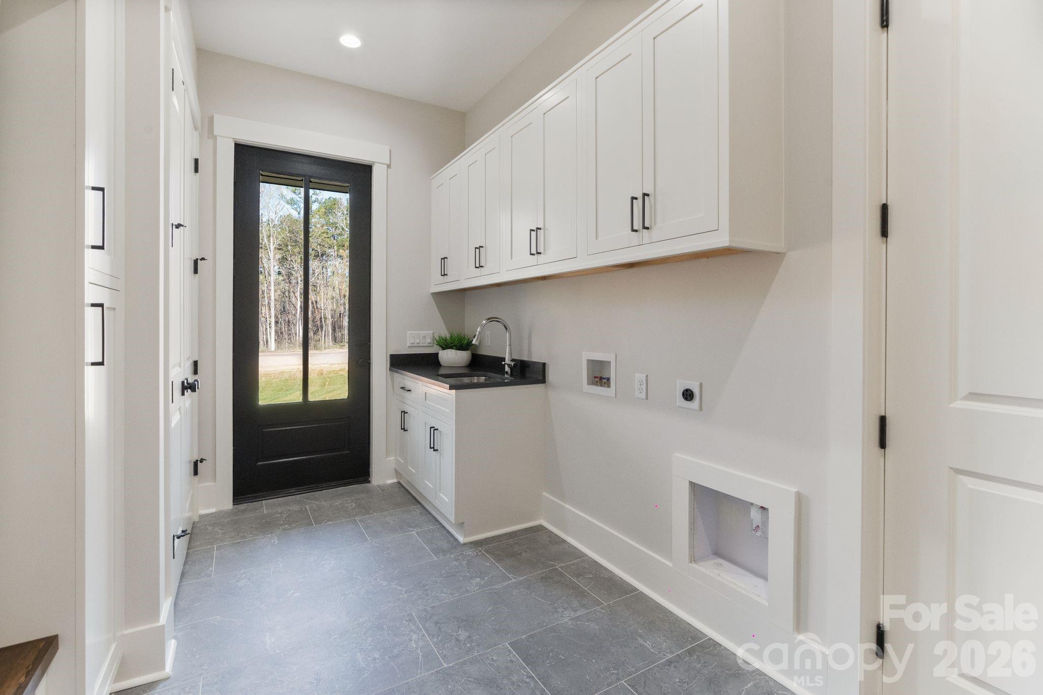 568 Longleaf Pine Lane Clover, SC 29710 - Photo 34 of 48 a kitchen with cabinets and a stove