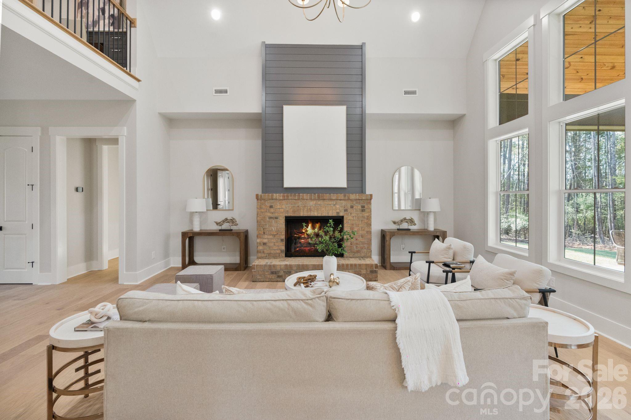 568 Longleaf Pine Lane Clover, SC 29710 - Photo 4 of 48 a living room with furniture and a fireplace