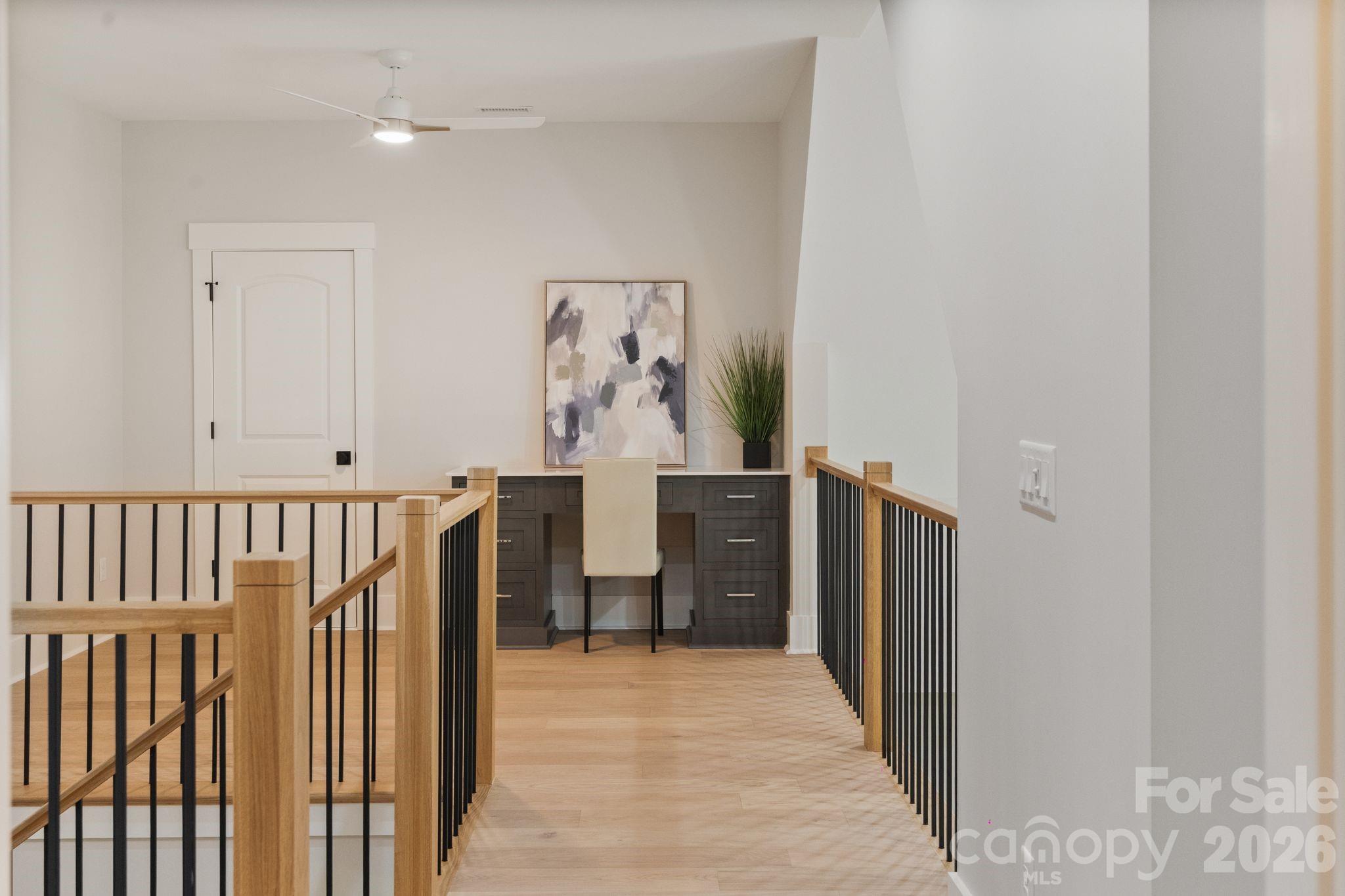 568 Longleaf Pine Lane Clover, SC 29710 - Photo 41 of 48 a view of a hallway with wooden floor