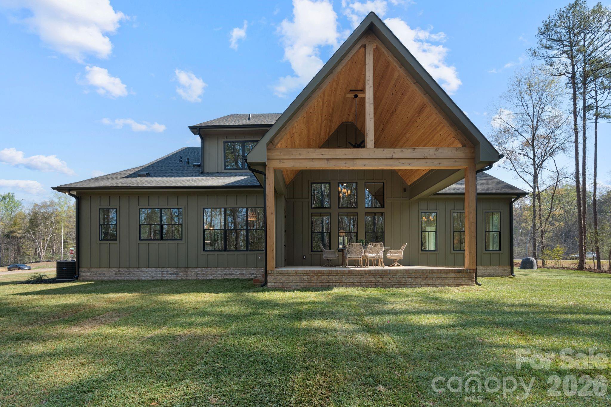 568 Longleaf Pine Lane Clover, SC 29710 - Photo 44 of 48 a front view of a house with a yard