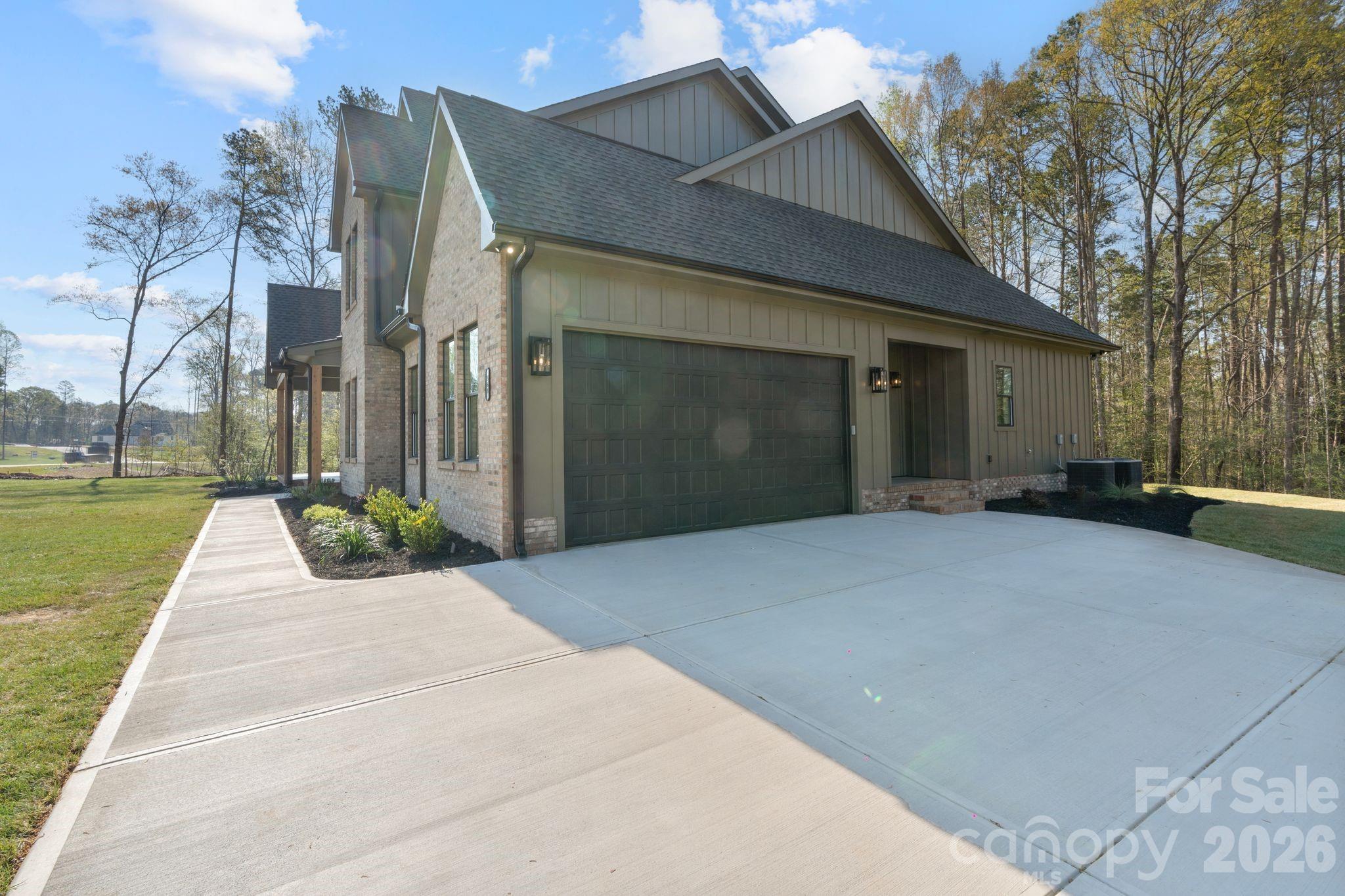 568 Longleaf Pine Lane Clover, SC 29710 - Photo 46 of 48 a view of a house with a yard