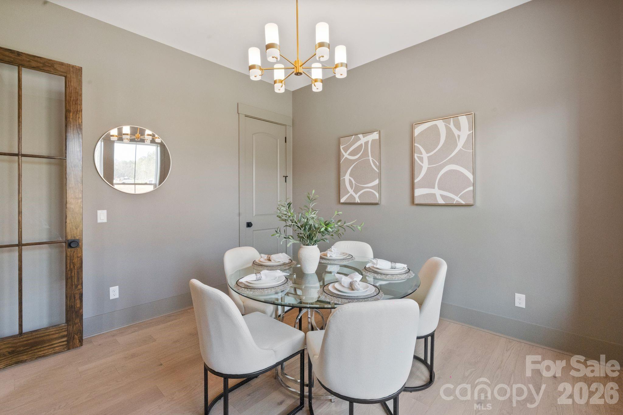 568 Longleaf Pine Lane Clover, SC 29710 - Photo 5 of 48 a dining room with furniture and chandelier