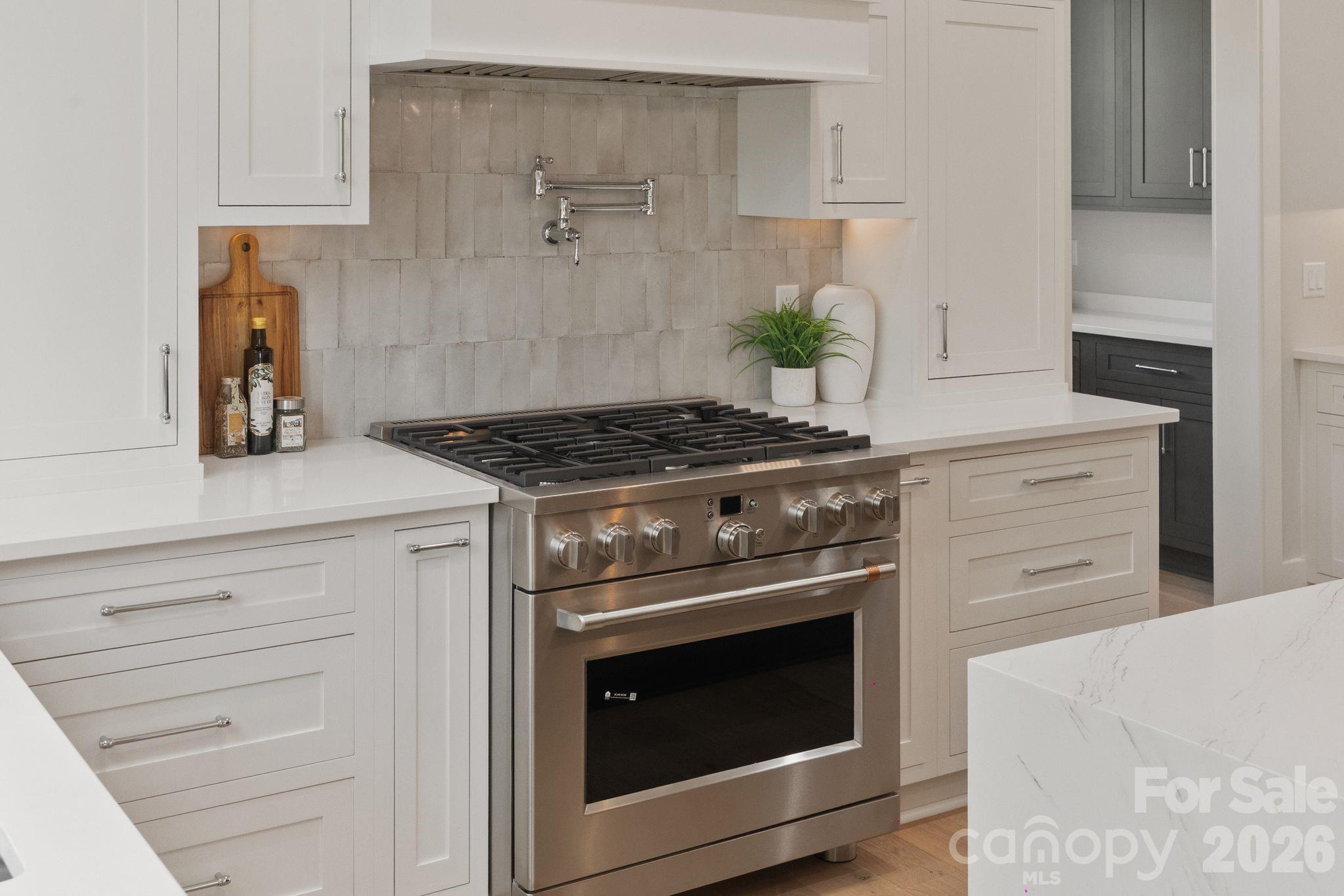 568 Longleaf Pine Lane Clover, SC 29710 - Photo 7 of 48 a stove top oven sitting inside of a kitchen