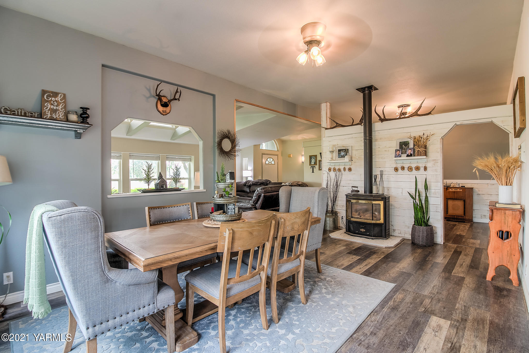251 Wellner Road Outlook, WA 98938 - Photo 8 of 45 a view of a dining room with furniture window and wooden floor