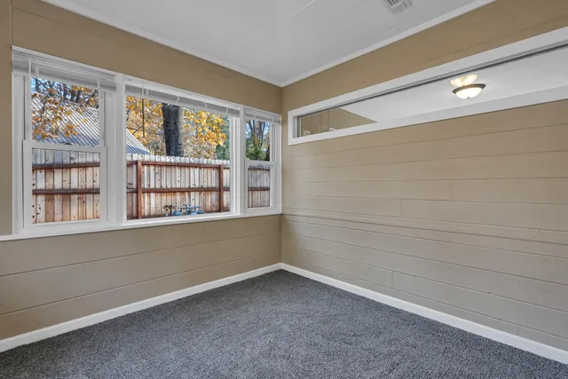 a house with trees in front of it