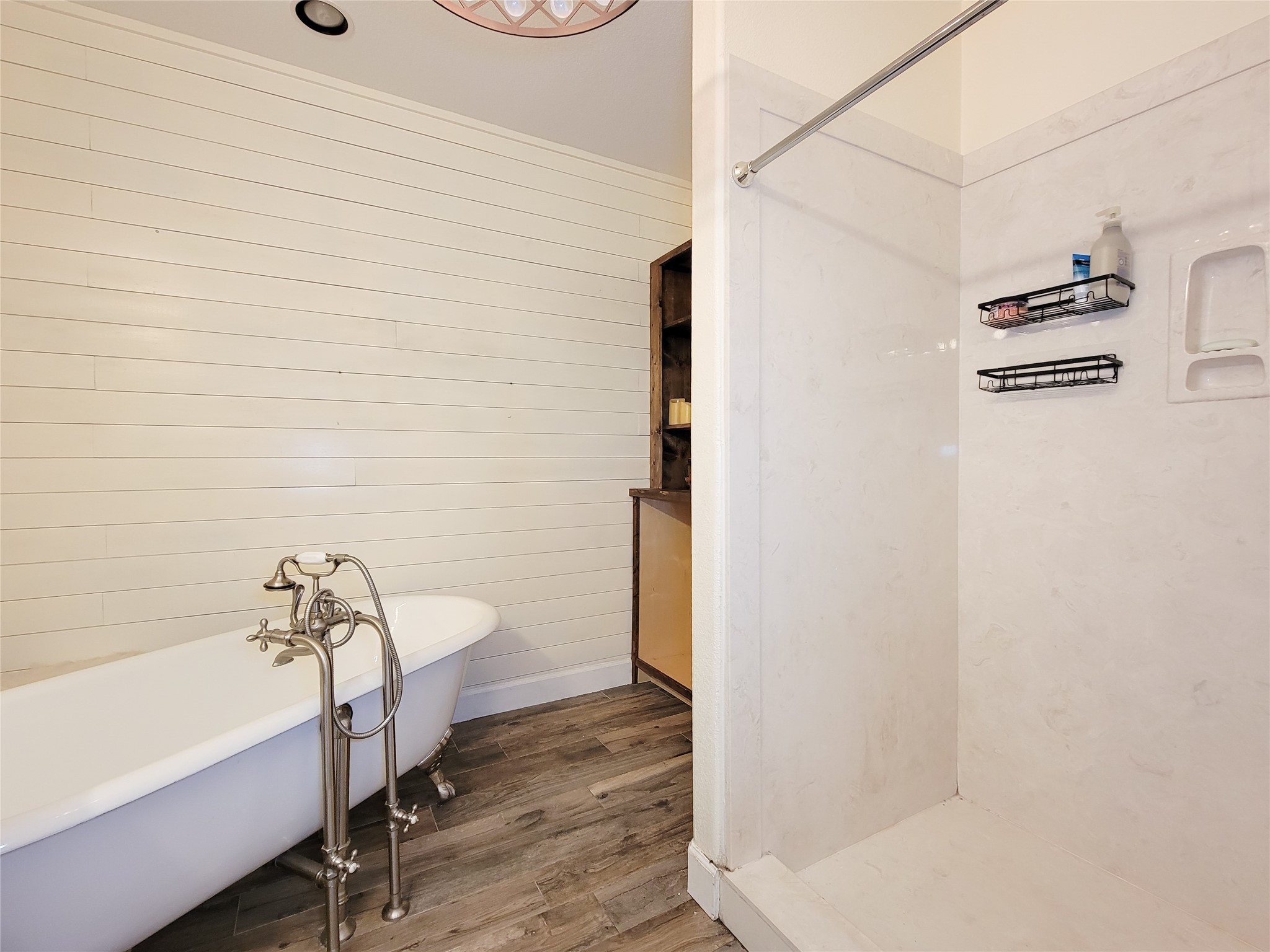 2011 Old Ox Road Spring, TX 77386 - Photo 12 of 38 a bathroom with a bathtub and shower