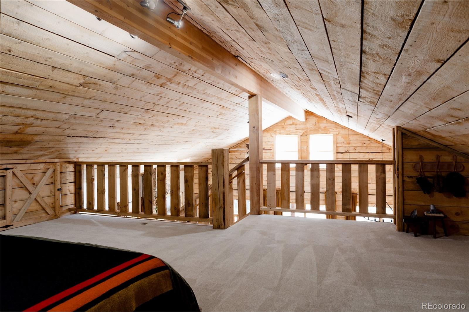 13574 Baird Road Conifer, CO 80433 - Photo 19 of 50 a view of balcony with couch