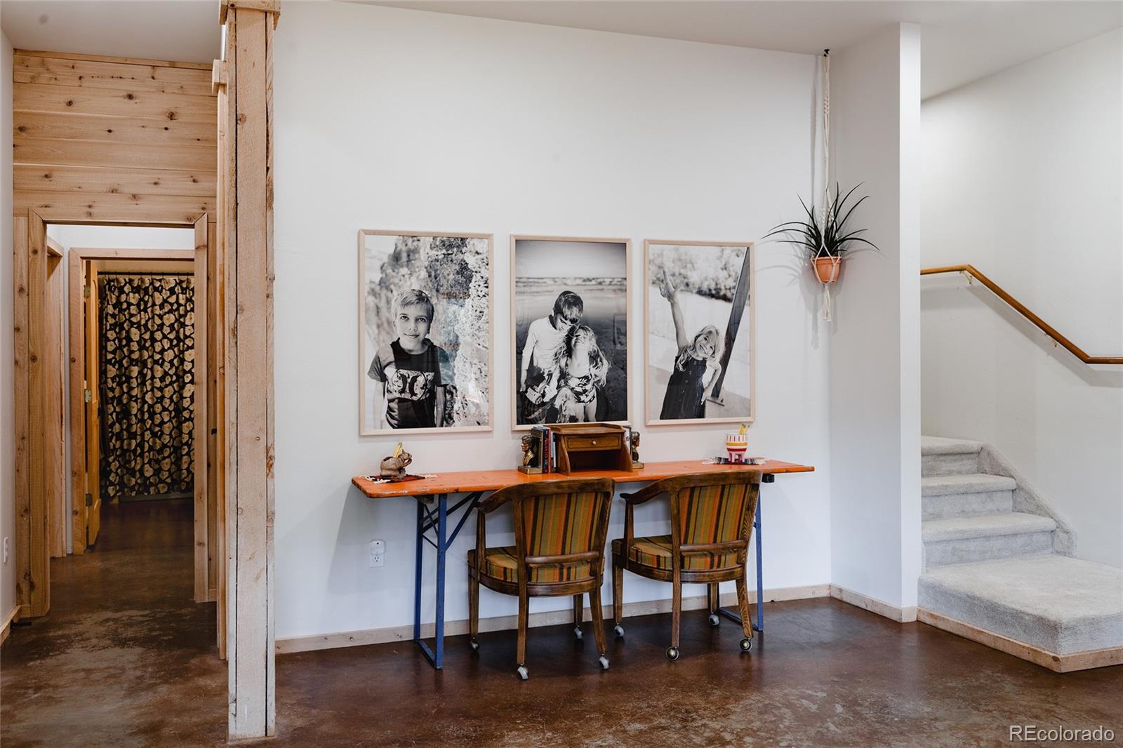 13574 Baird Road Conifer, CO 80433 - Photo 23 of 50 a view of a dining room with furniture and wooden floor