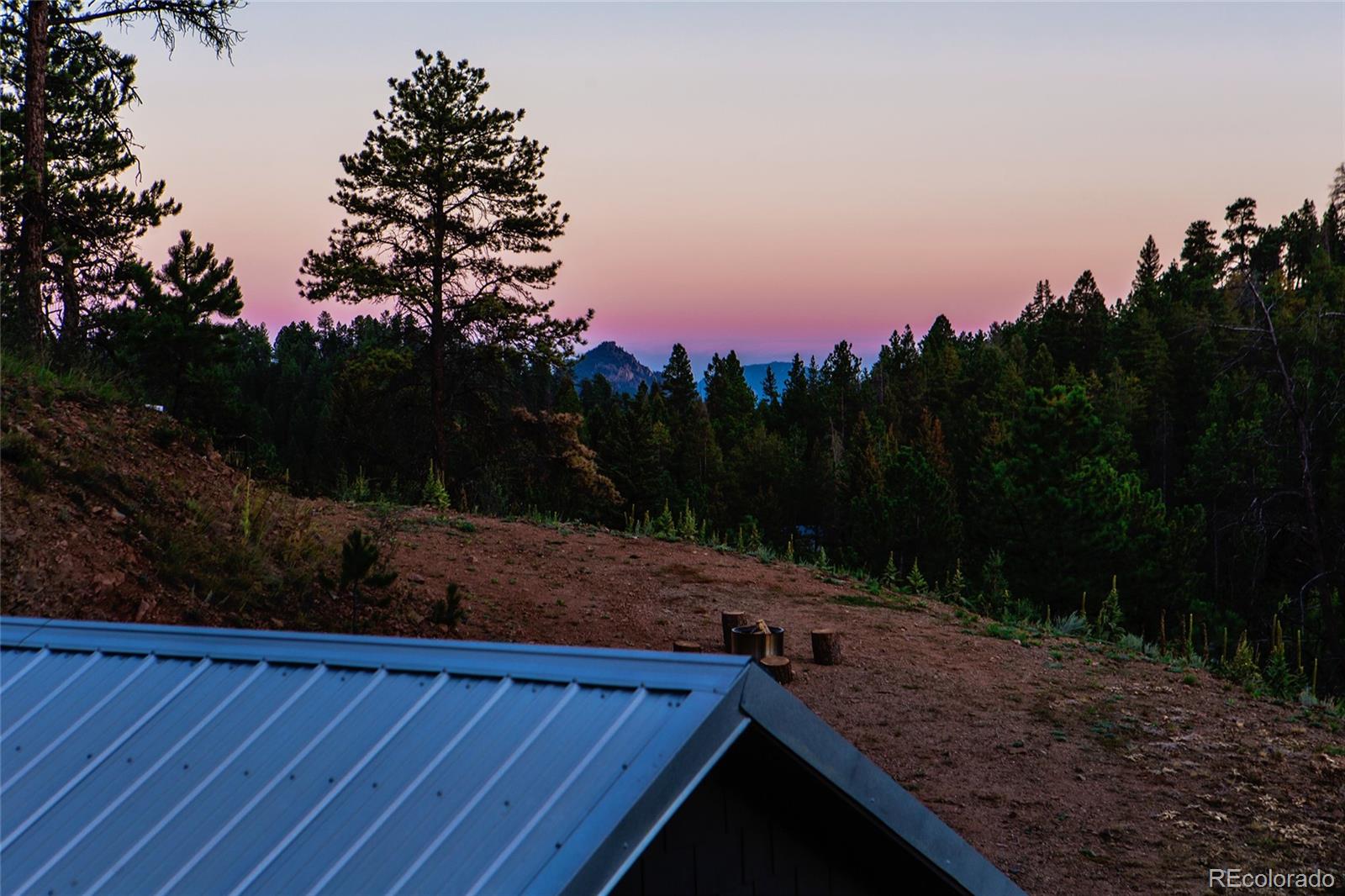 13574 Baird Road Conifer, CO 80433 - Photo 37 of 50 a view of a backyard