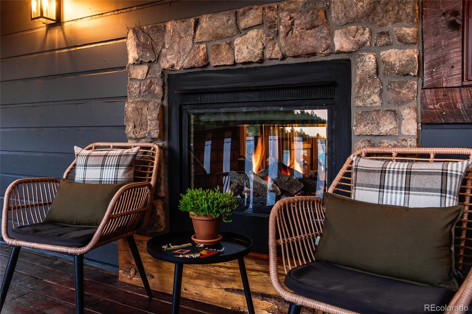 13574 Baird Road Conifer, CO 80433 - Photo 38 of 50 a view of a chair and table in the balcony