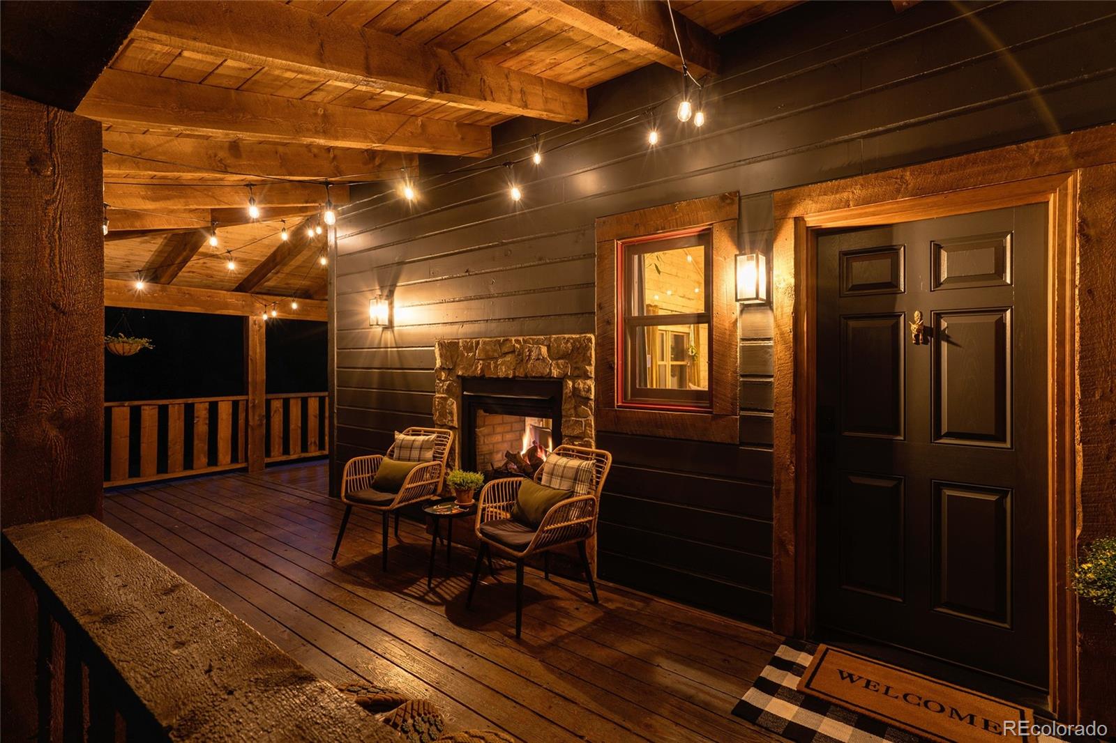 13574 Baird Road Conifer, CO 80433 - Photo 41 of 50 a outdoor space with wooden floor