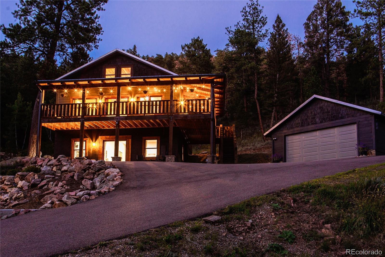 13574 Baird Road Conifer, CO 80433 - Photo 43 of 50 a front view of a house