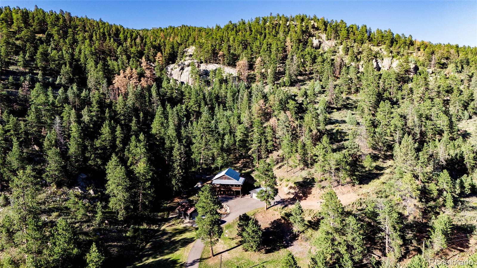 13574 Baird Road Conifer, CO 80433 - Photo 44 of 50 a view of a large yard