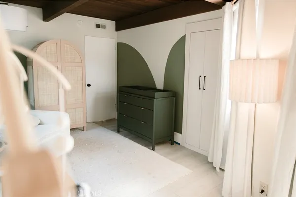 a bathroom with a toilet sink and shower