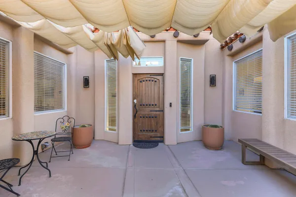 a view of an entryway with a chandelier