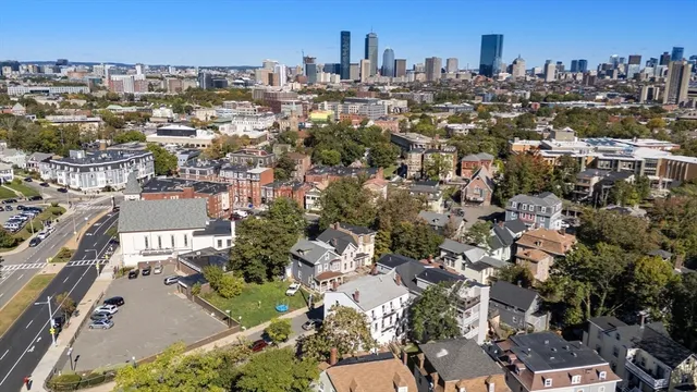 an aerial view of a city with lots of residential buildings