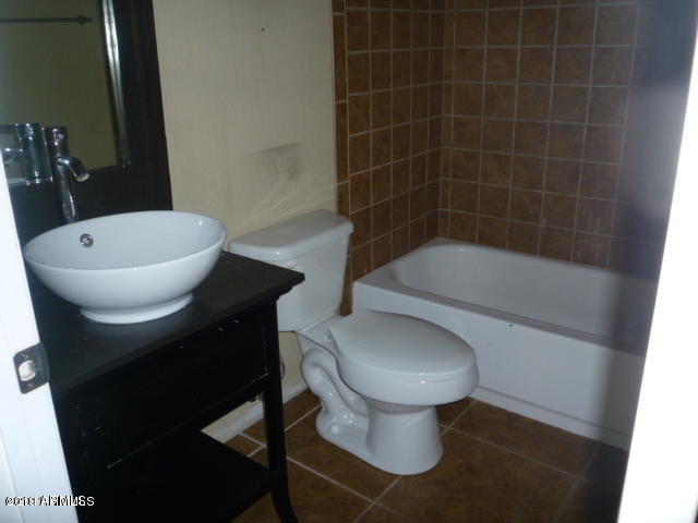 4816 East Corral Road, Unit 1 Phoenix, AZ 85044 - Photo 3 of 5 a bathroom with a toilet and a sink
