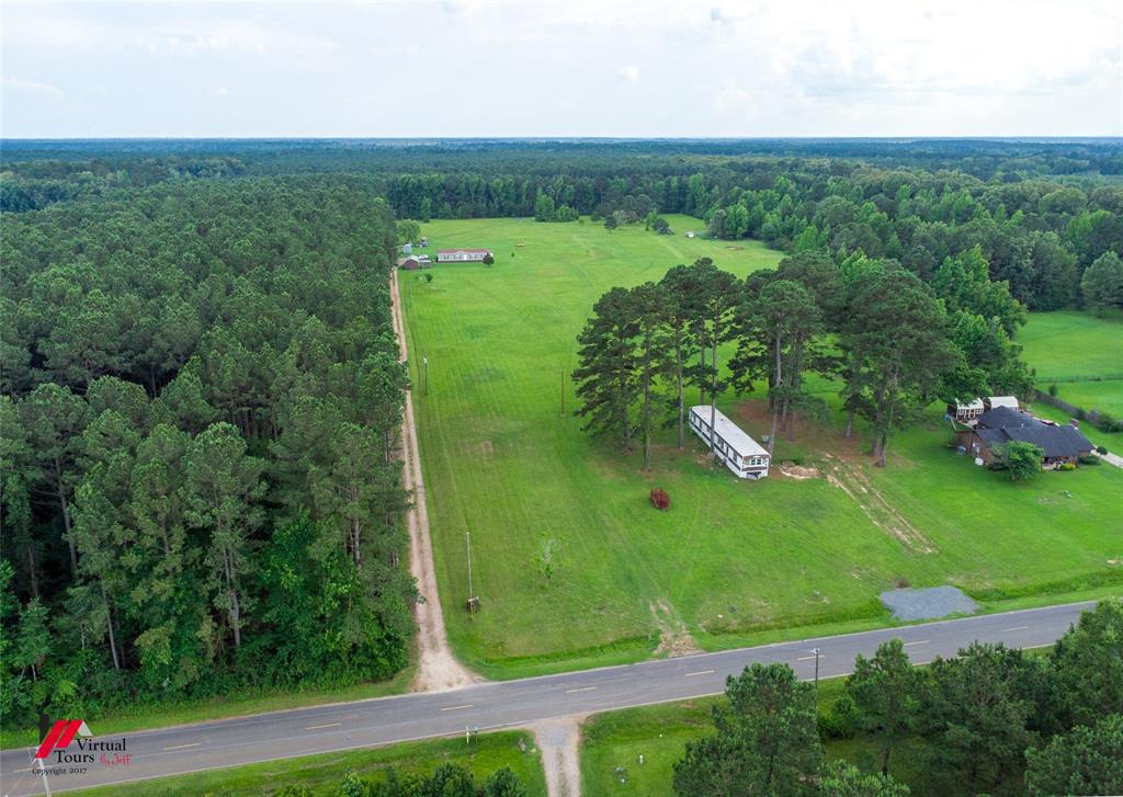 555 Thomasville Road Sarepta, LA 71071 - Photo 30 of 40 an aerial view of a houses with outdoor space and street view
