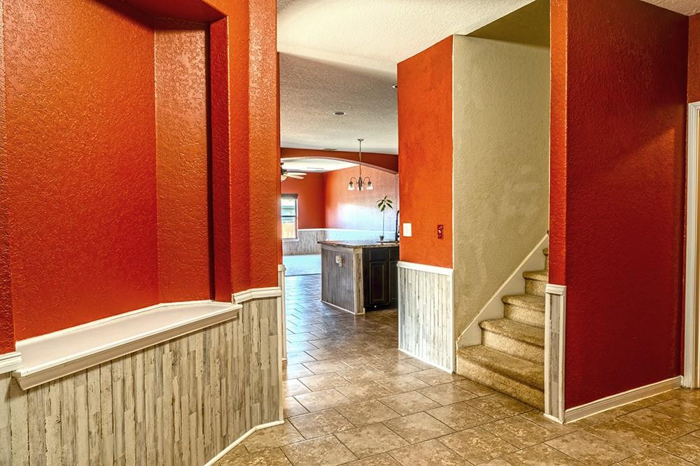 7103 Azalea Square San Antonio, TX 78218 - Photo 20 of 21 a view of a kitchen from the hallway