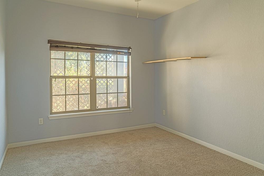 7103 Azalea Square San Antonio, TX 78218 - Photo 10 of 21 an empty room with a window