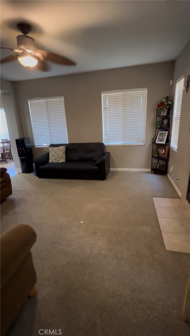1474 Albillo Loop Perris, CA 92571 - Photo 8 of 13 a living room with furniture