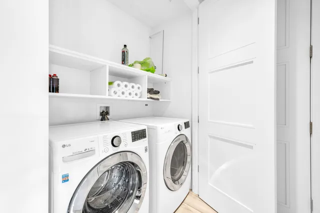 a utility room with dryer and washer