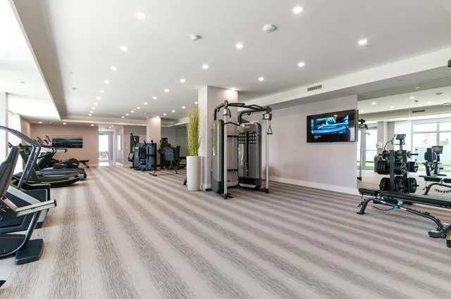 a view of a room with gym equipment