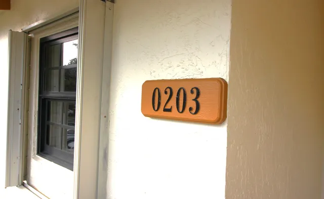 a sign that is on the wall of a building