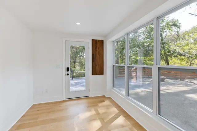 a view of an empty room and window
