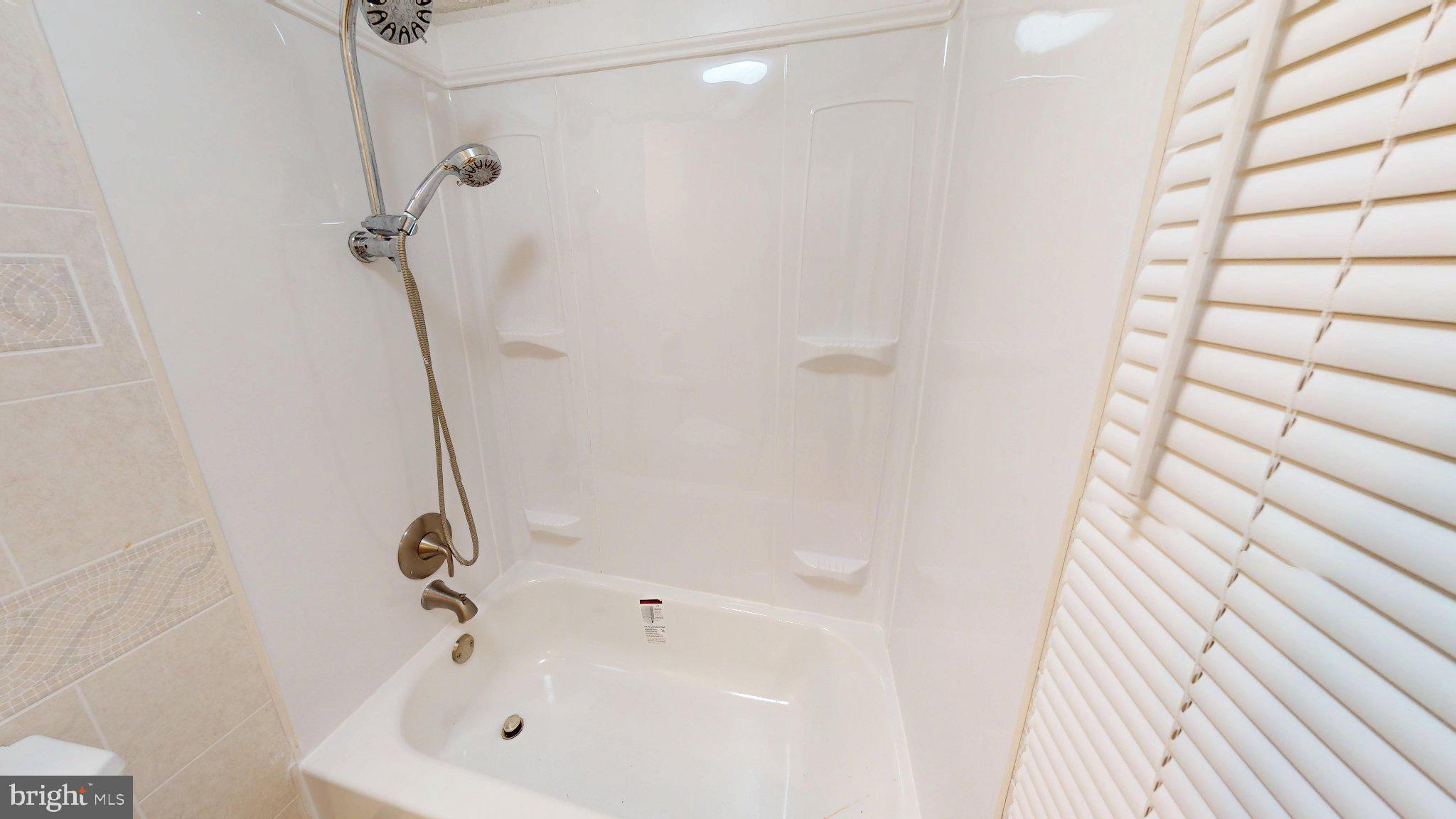 669 North Henderson Road King of Prussia, PA 19406 - Photo 23 of 84 Modern shower and tub combination.