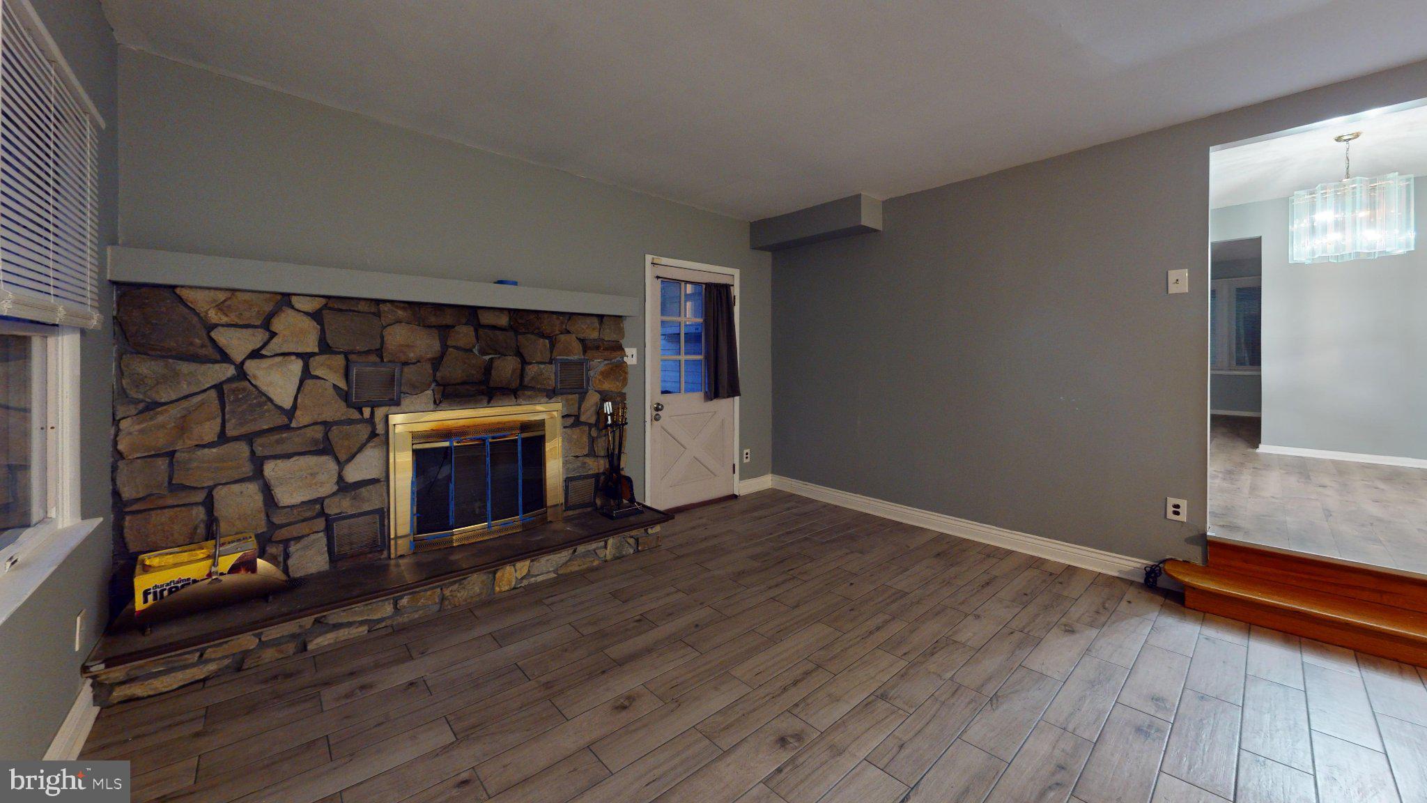 669 North Henderson Road King of Prussia, PA 19406 - Photo 73 of 84 Cozy living space with stone fireplace.