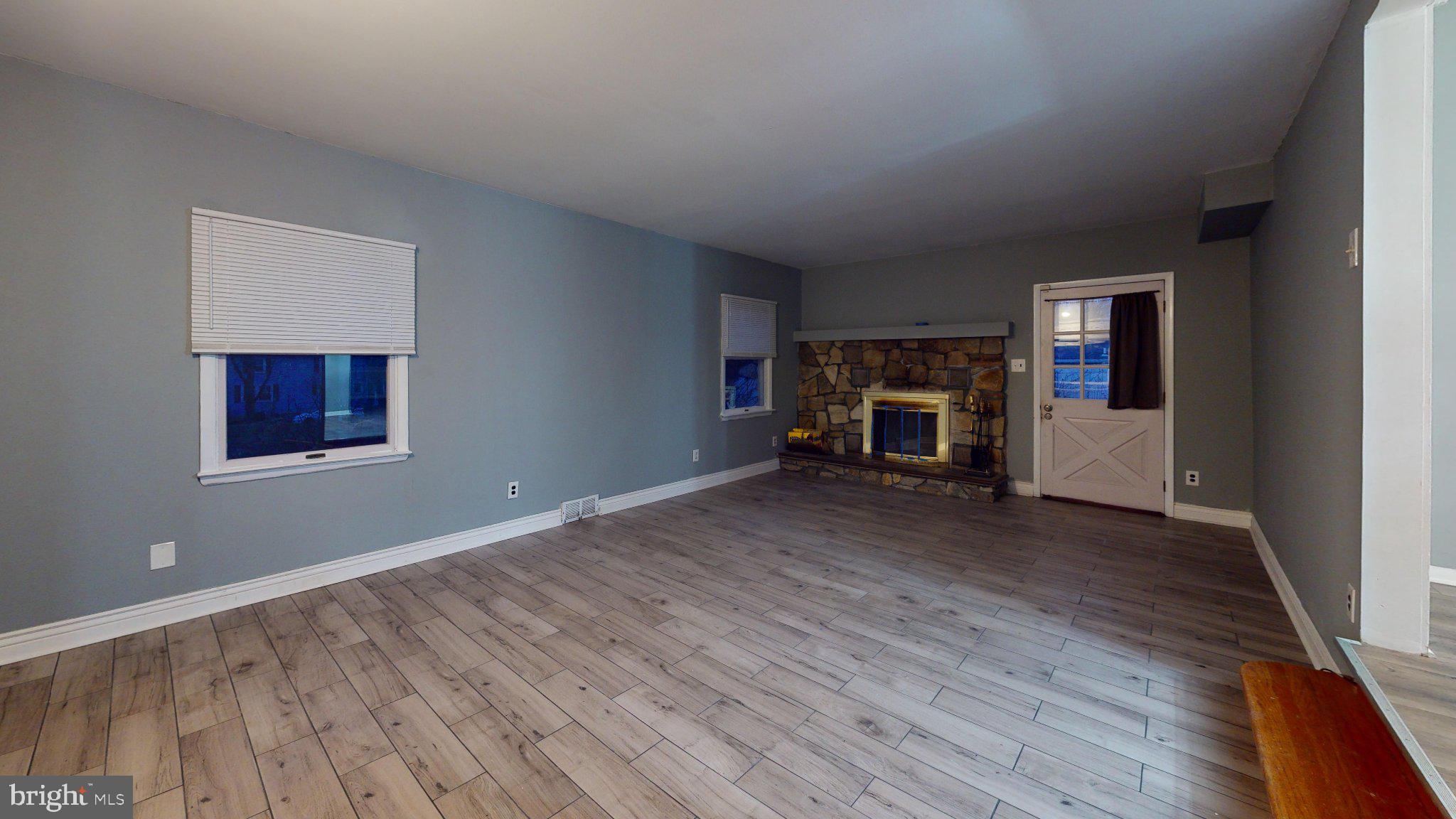669 North Henderson Road King of Prussia, PA 19406 - Photo 77 of 84 Spacious living area with cozy fireplace.