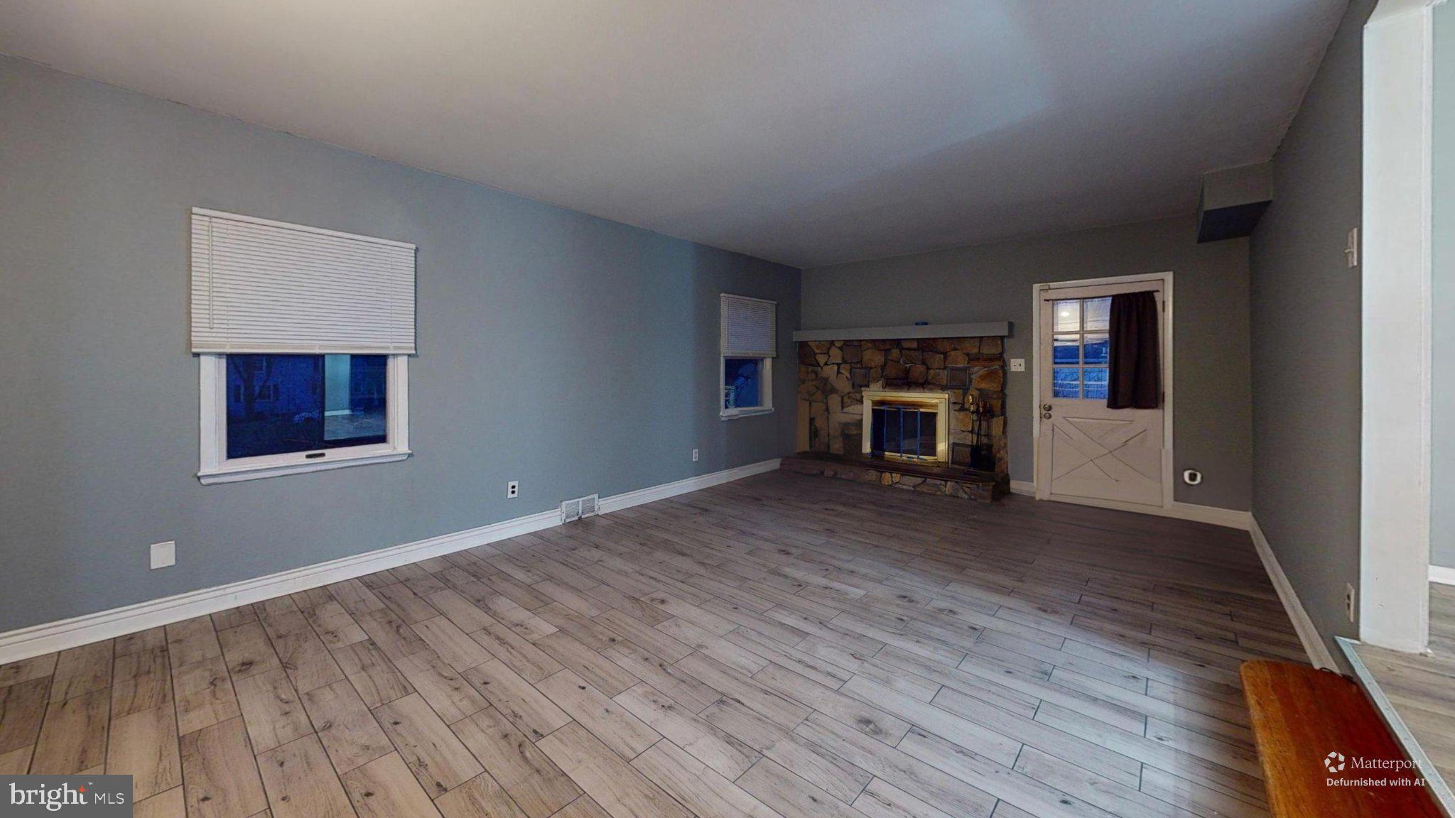 669 North Henderson Road King of Prussia, PA 19406 - Photo 80 of 84 Spacious room with cozy fireplace charm.