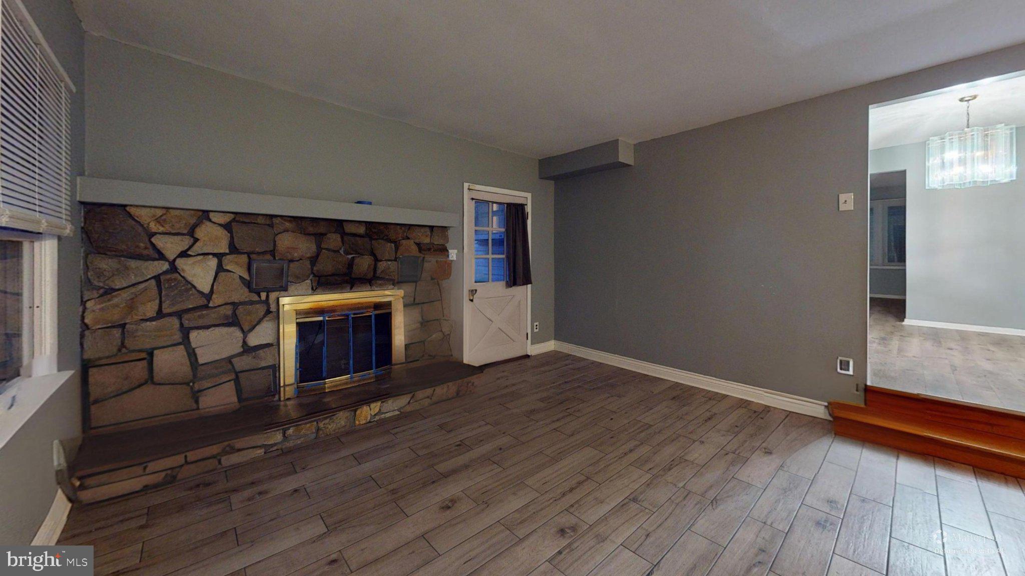 669 North Henderson Road King of Prussia, PA 19406 - Photo 84 of 84 Cozy living space with stone fireplace.